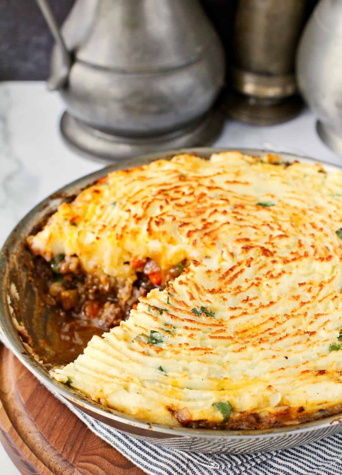 Shepherd's Pie in the pan with a slice removed.