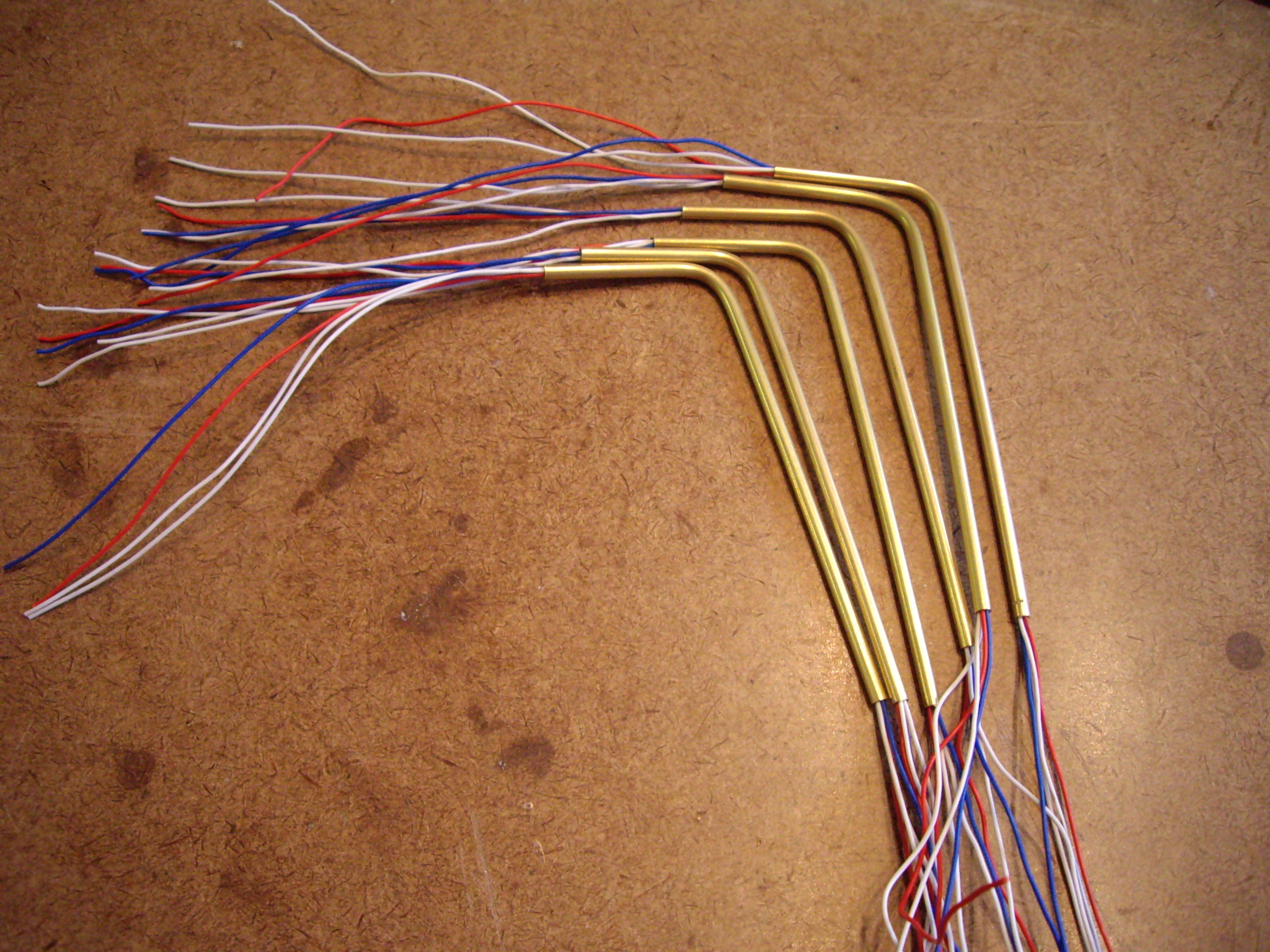 6 – 4 inch lengths of 3/36 inch copper tubing bent to about 80 degrees to form a light standard