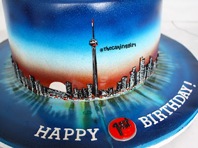 hand painted edible toronto skyline cake