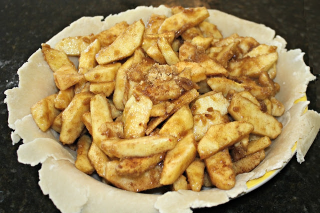 Apple pie filling in an unbaked crust