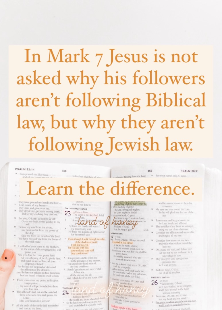 A hand is holding up an open Bible in front of a white background. Text overlay reads: In Mark 7 Jesus is not asked why his followers aren't following Biblical law, but why they aren't following Jewish law. Learn the difference. | Land of Honey