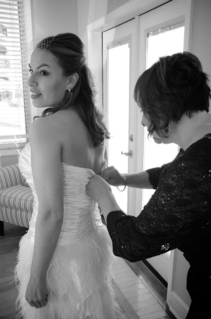 Photography of bride getting ready for her beach wedding