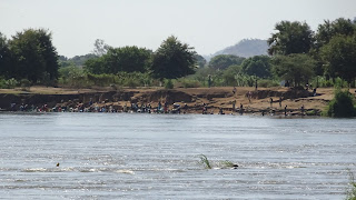 Everybody is cleaning themselves in the river