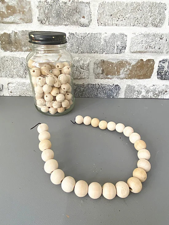 jar of beads and beaded handle