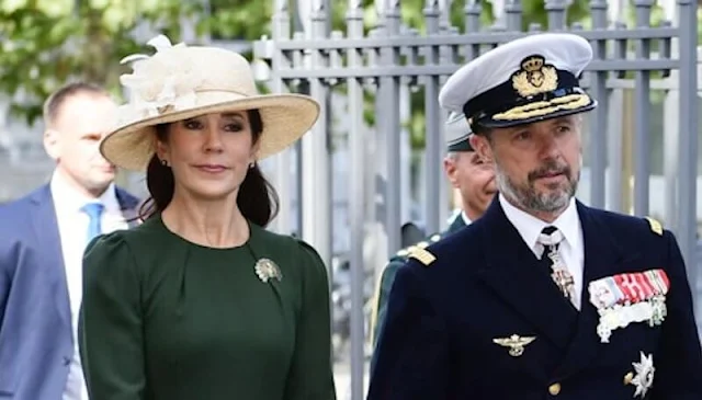 Crown Princess Mary wore a Yahvi olive green midi dress by Beulah London. Crown Prince Frederik and Crown Princess Mary