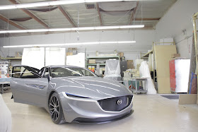 Front 3/4 view of Mazda Deep Orange 3