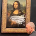 Tortát vágott a Mona Lisához egy nőnek öltözött parókás férfi a Louvre-ban (videó)