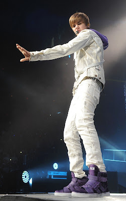 Justin Bieber performing at the American Airlines Arena and out with Selena Gomez