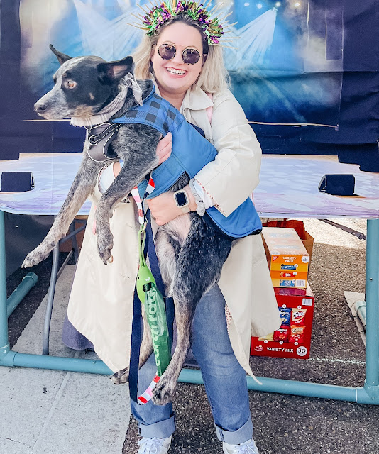 Katie and her dog, Ripley at a Mardi Gras parade