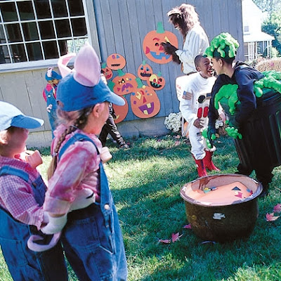 The fun Halloween game Mix-and-match Pumpkin Patch Game require participants to transform plain paper pumpkins into wacky jack-o'-lanterns.