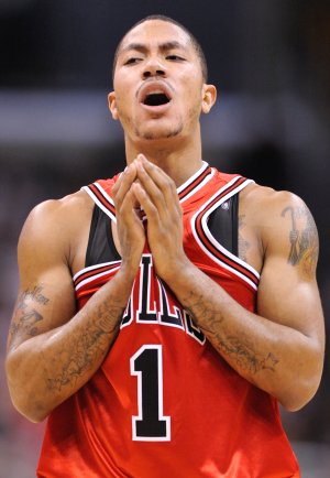 derrick rose tattoos on arm. derrick rose tattoos 2011.