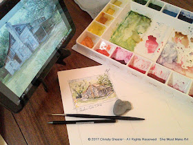 Creating the first watercolor thumbnail sketch for this project with pen and watercolor.