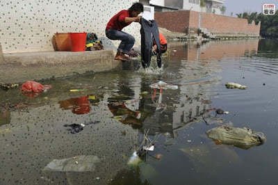 China’s Electronic Waste Hell Seen On www.coolpicturegallery.us