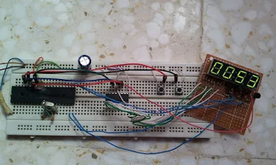 Digital up/down counter using 7 segment display with multiplexing and 74HC595 and PIC16F877A circuit