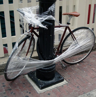 bicycle wrapped in plastic wrap