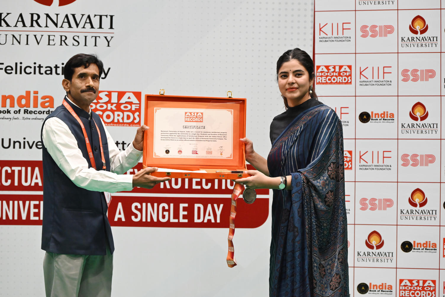 Gujarat-based Karnavati University felicitated by Asia Book of Records and India Book of Records for filing record 295 Intellectual Property Applications