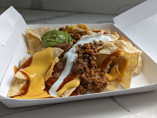 Side view of Taco Bell Loaded Beef Nachos.
