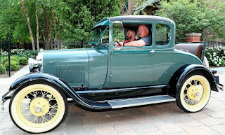 Drew Ann Reid's father Andy with a classic car