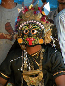 Dancer wearing a ritual mask in Nepal