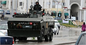 mayhem spreads in tunisia as curfew decreed