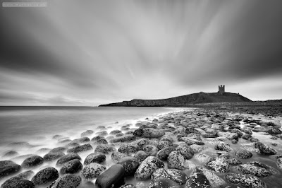 Dunstanburgh boulders long exposure