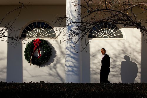 President Obama whistling by Pete Souza