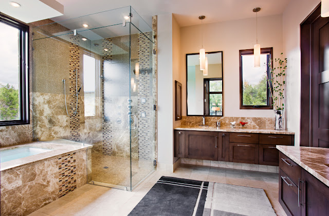 Picture of modern luxury bathroom in the Texas style wit dark wood, glass and stone