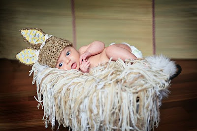 Cute baby wearing the cat cap