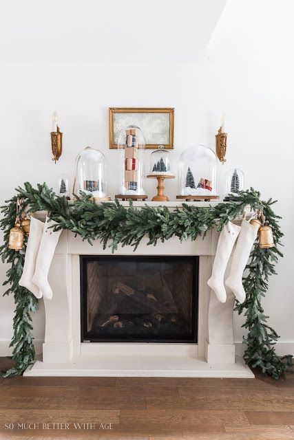 Christmas mantel decor with cloches