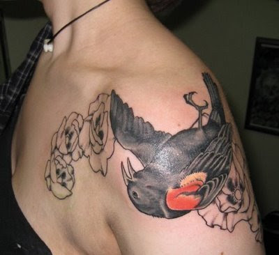 cross with angel wings tattoo