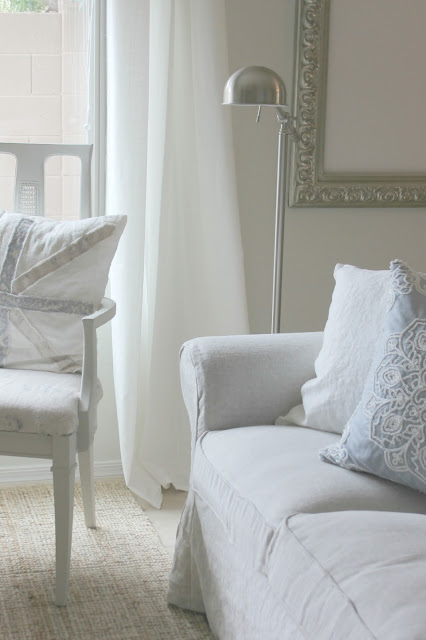 Serene neutral living and dining room decor DIY makeover on Hello Lovely Studio