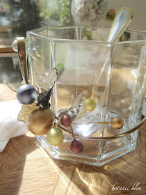 Thanksgiving gold and white table setting with vintage glass bucket for cranberry sauce