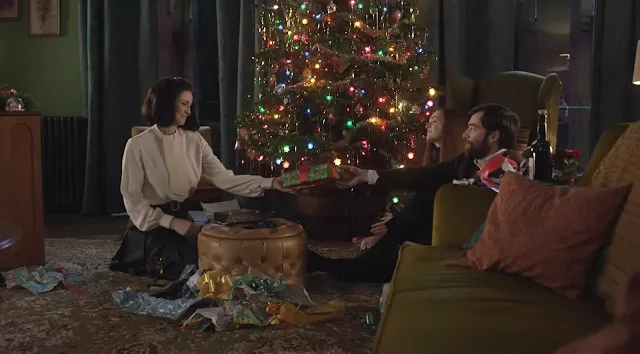 Claire, Bree, and Roger at Christmas