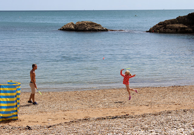 beach-badminton-flying-girl-lulworth-cove-sea-level-todaymywayblog