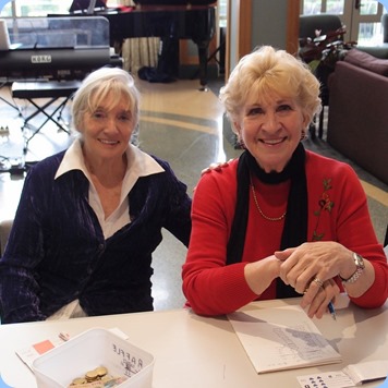 Delyse Whorwood and Margaret Black on the desk.