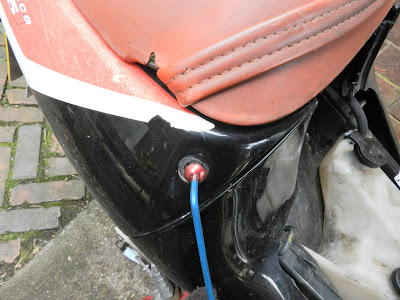 Aprilia RS 125 side and rear seat fairing  panel removal to access CDI , PV controller , Indicator relay & regulator rectifier