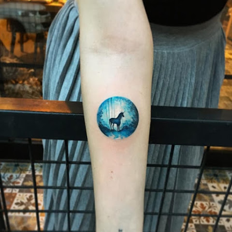 Wonderful Scenery Tattoos in Miniature Circles by Eva Krbdk