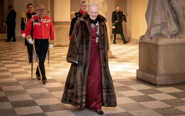 Princess Mary in bordeaux gown by Lasse Spangenberg. Queen Margrethe wore a bordeaux dress by Craftsmen's Association