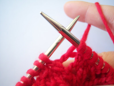 To yarn over (yo), simply move the yarn to the front.