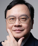 A headshot of Dr. Dennis Lo