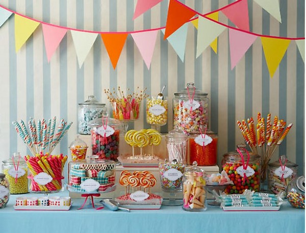  setting up a cute candy buffet with the decorations and all Heheheh