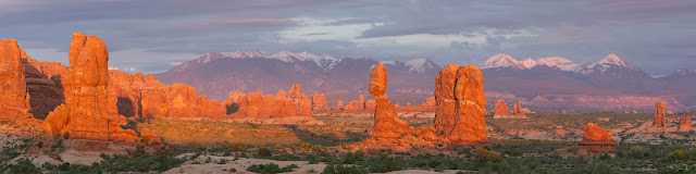 Panorama of Arches National Park with Balanced Rock Turret Arch and the La Sal Mountains