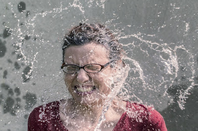 image:  https://pixabay.com/photos/woman-splash-water-face-glasses-438399/