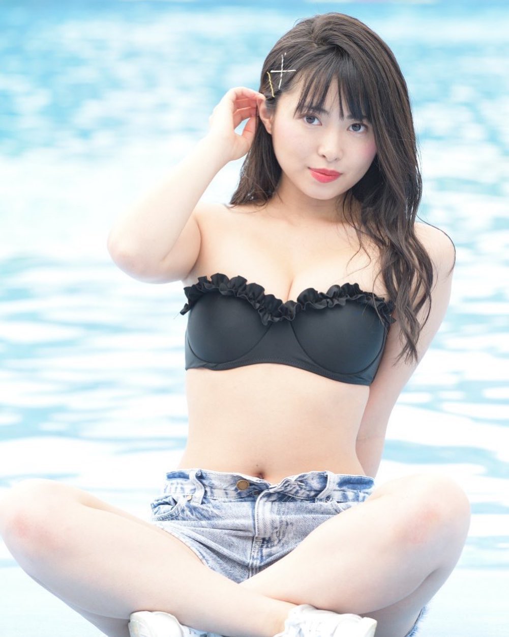 Nozomi Sato sexy Japanese gravure idol in cute black bikini top