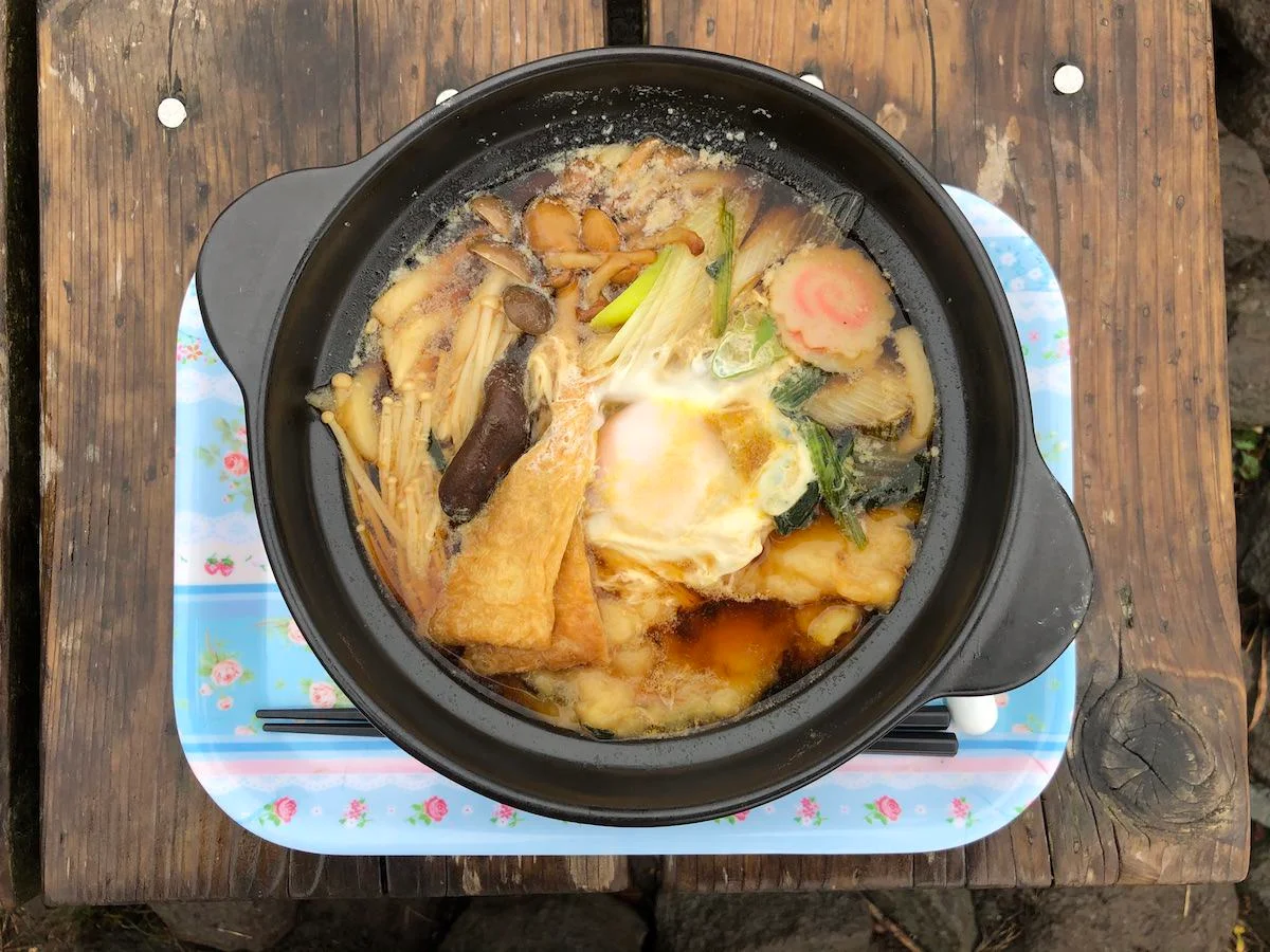A hot bowl of Nabeyaki Udon served at Nabewari Sanso at the peak of Mt. Nabewari