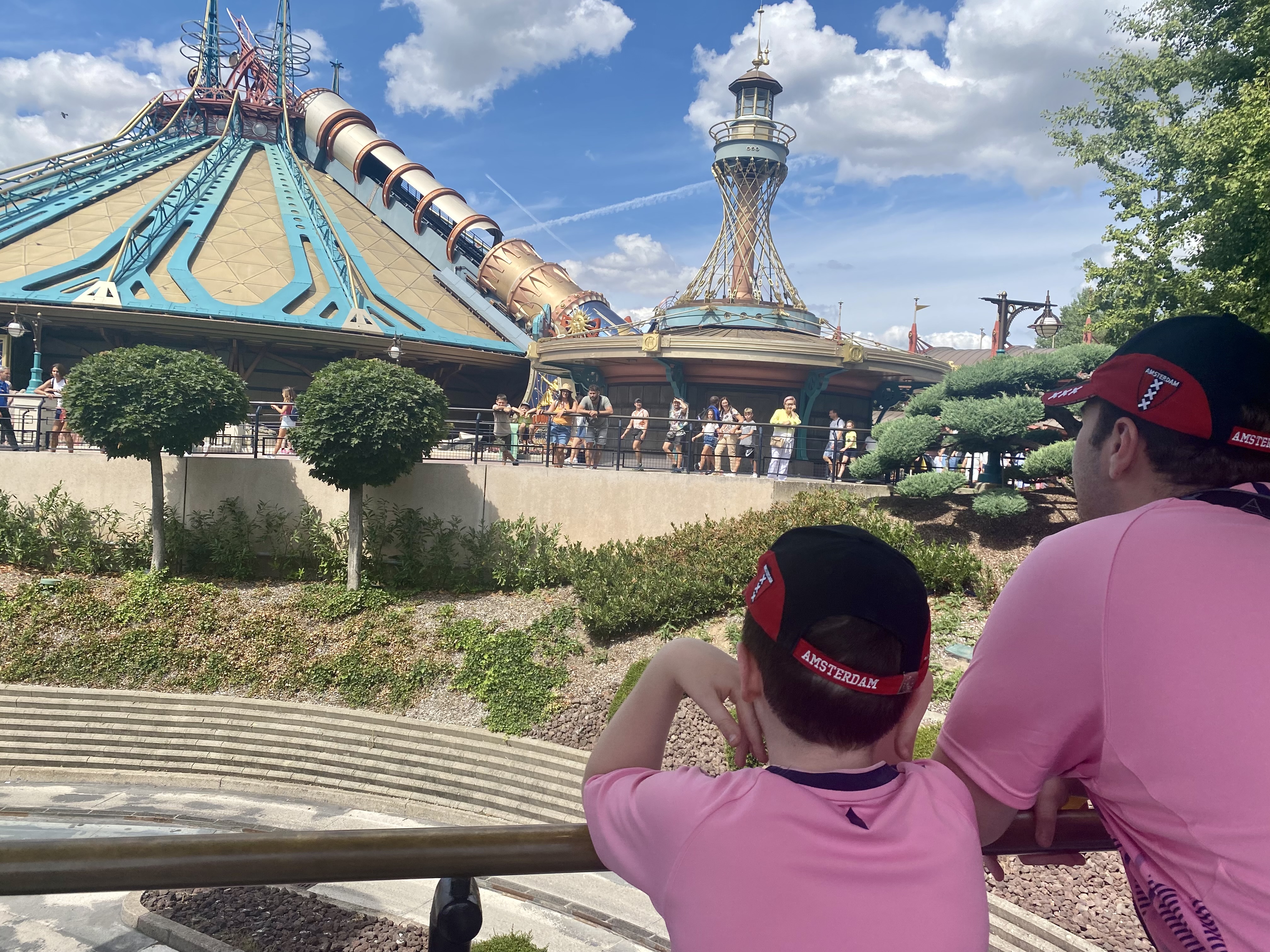 two boys looking at space mountain