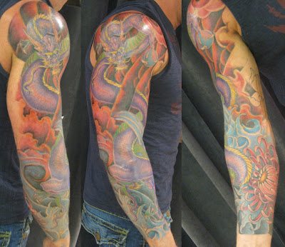 Half sleeve dragon tattoo