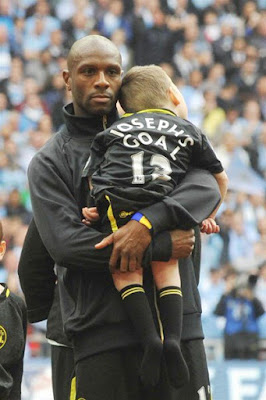 Emmerson Boyce with Joesph Kendrick at the 2013 FA Cup Final