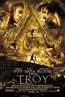 <a href="url gambar"><img alt="review movie troy" src="urlgambar" title="review movie troy" />