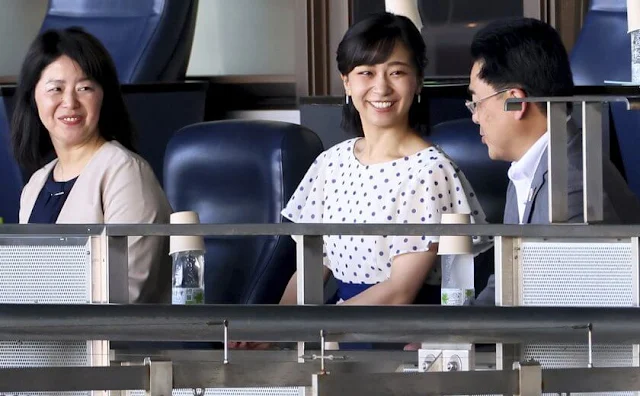 Japanese Princess Kako wore a blue and white polka-dot silk dress. The Girls High School Baseball tournament in Nishinomiya